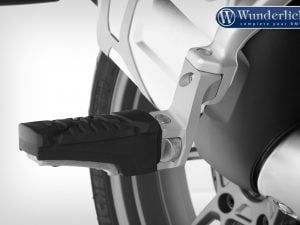 Verlaging van de passagiersvoetsteun